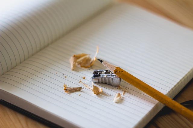 teen writing - new notebook and freshly sharpened pencil